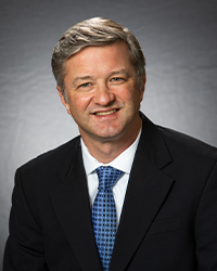 Headshot of Lon Brenner